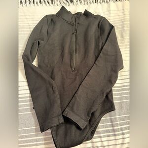 OQQ ribbed long sleeve bodysuit.